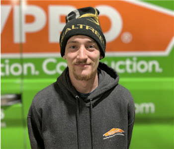 SERVPRO employee with hat