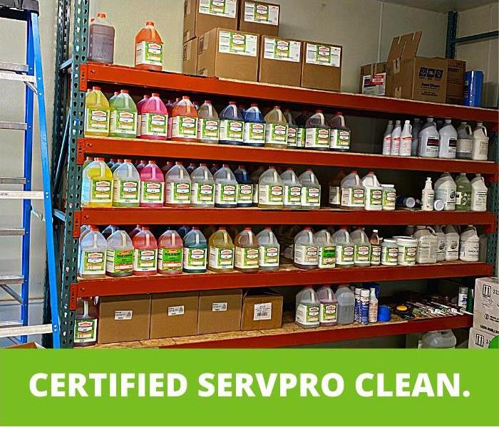 Shelves of cleaners with text "Certified: SERVPRO Cleaned"